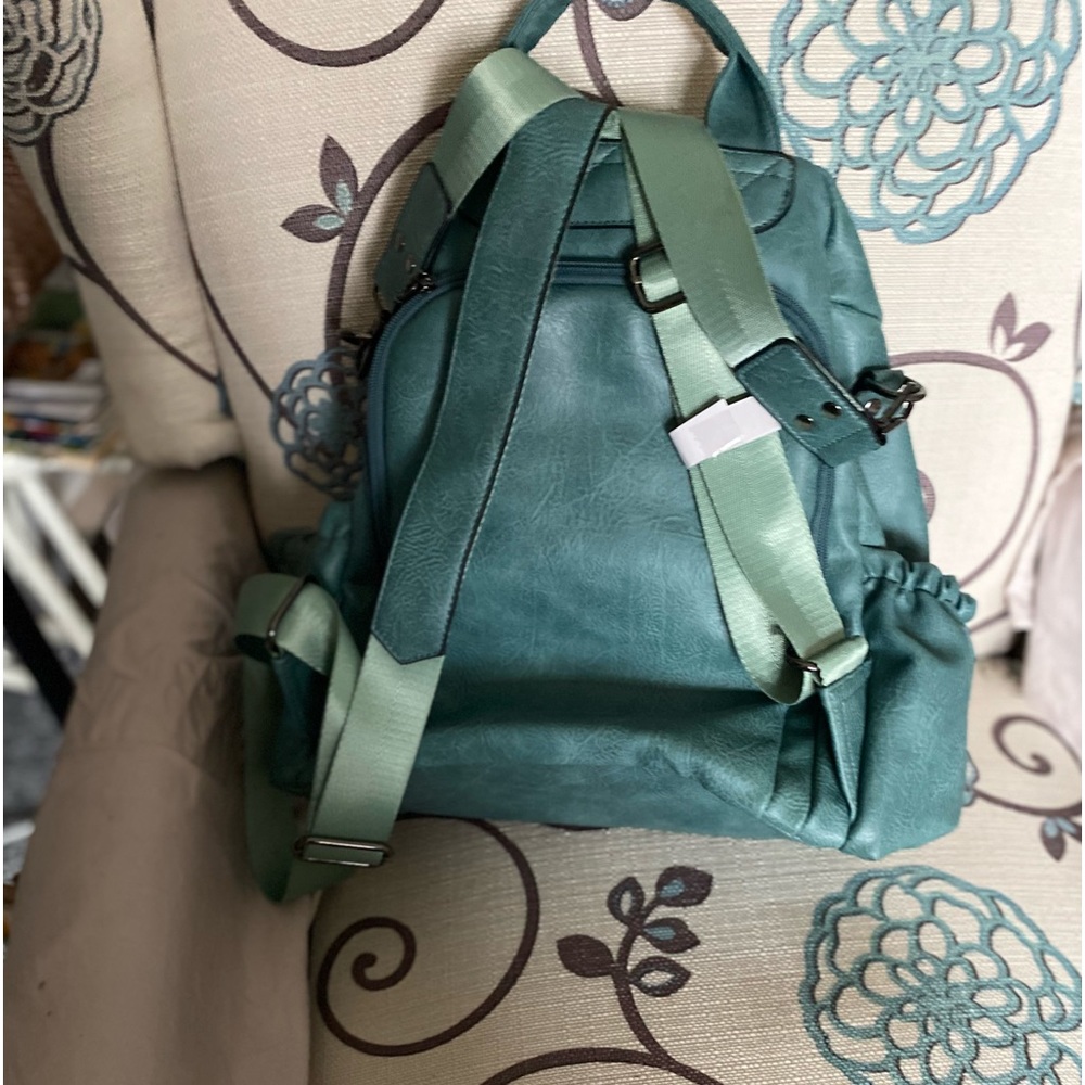 Teal color medium size backpack